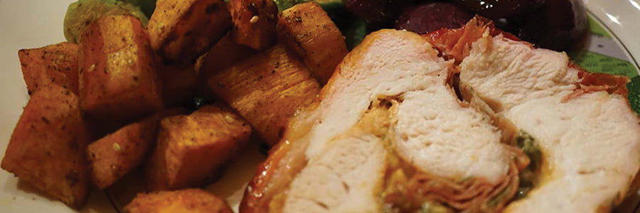 TURKEY BREAST STUFFED WITH BRIE, APPLE BUTTER, SAGE AND PROSCUITTO